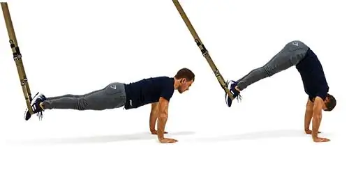 Мальчик делает TRX Pike