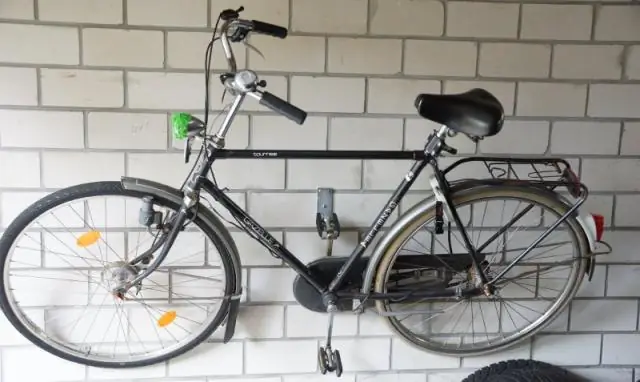 Как повесить велосипед на стене гаража?